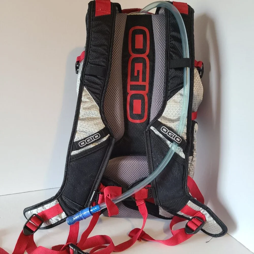OGIO ATLAS 100 HYDRATION BACKPACK-100 OZ/ 3L BLADDER- CHROME-BLACK/RED ACCENTS